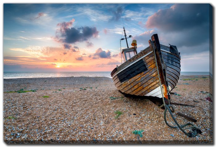 Fishing Boat On Pebble Beach